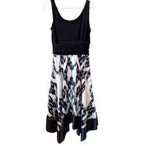Sleveless Flowy Dress Black White Midi Fit and Flare Bra Cups Stretchy